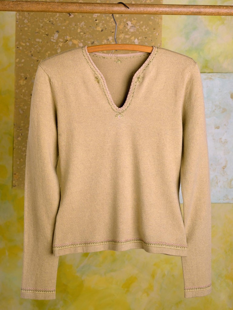 tan-shirt-on-hanger-on-gree